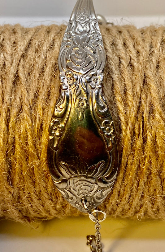 Bracelet-Single cuff with chain.