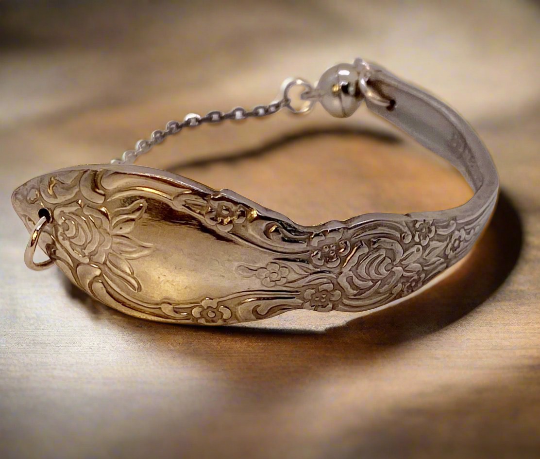 Bracelet-Single cuff with chain.